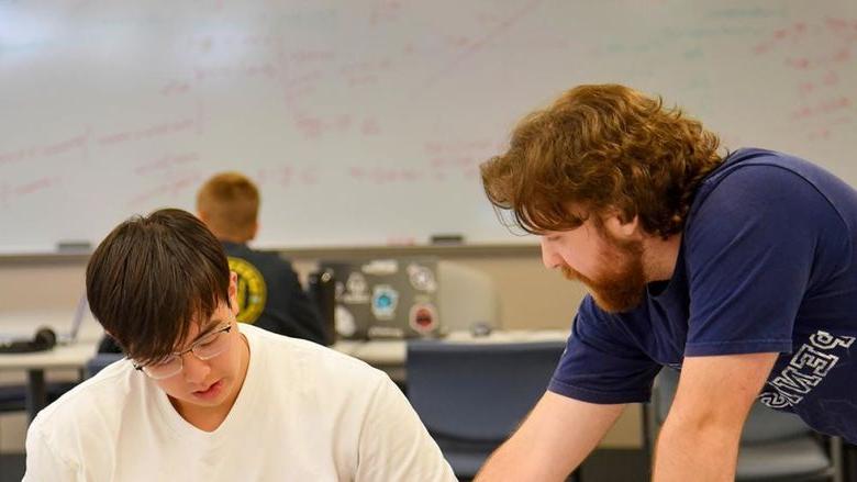 A student and a tutor work together at Penn State Altoona's Student Success Center